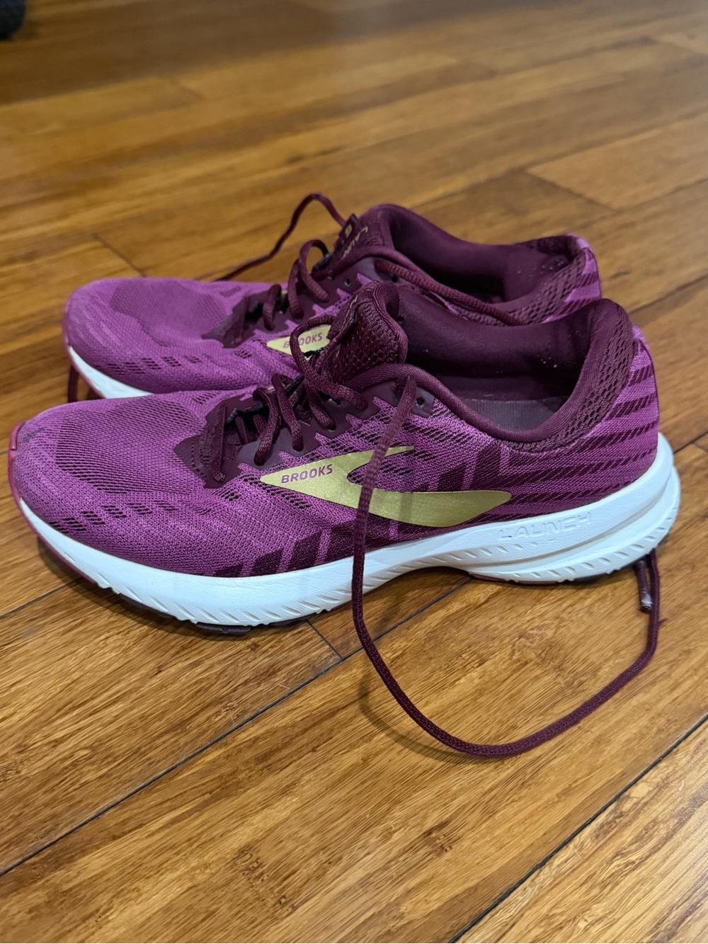 Brooks Launch 6 Women’s Running Shoes in Plum with Gold Accent 7.5